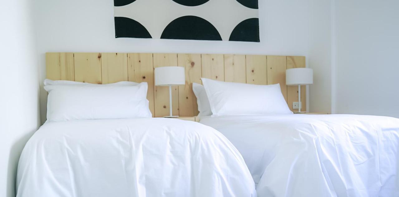 Casagrande Hotel & Beach Club José Ignacio Extérieur photo A bed with white sheets