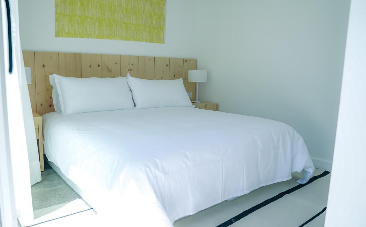 Casagrande Hotel & Beach Club José Ignacio Extérieur photo A bed with a duvet