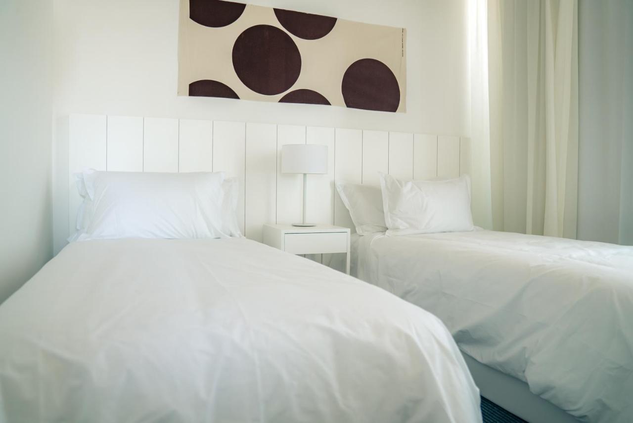 Casagrande Hotel & Beach Club José Ignacio Extérieur photo A bedroom with two single beds